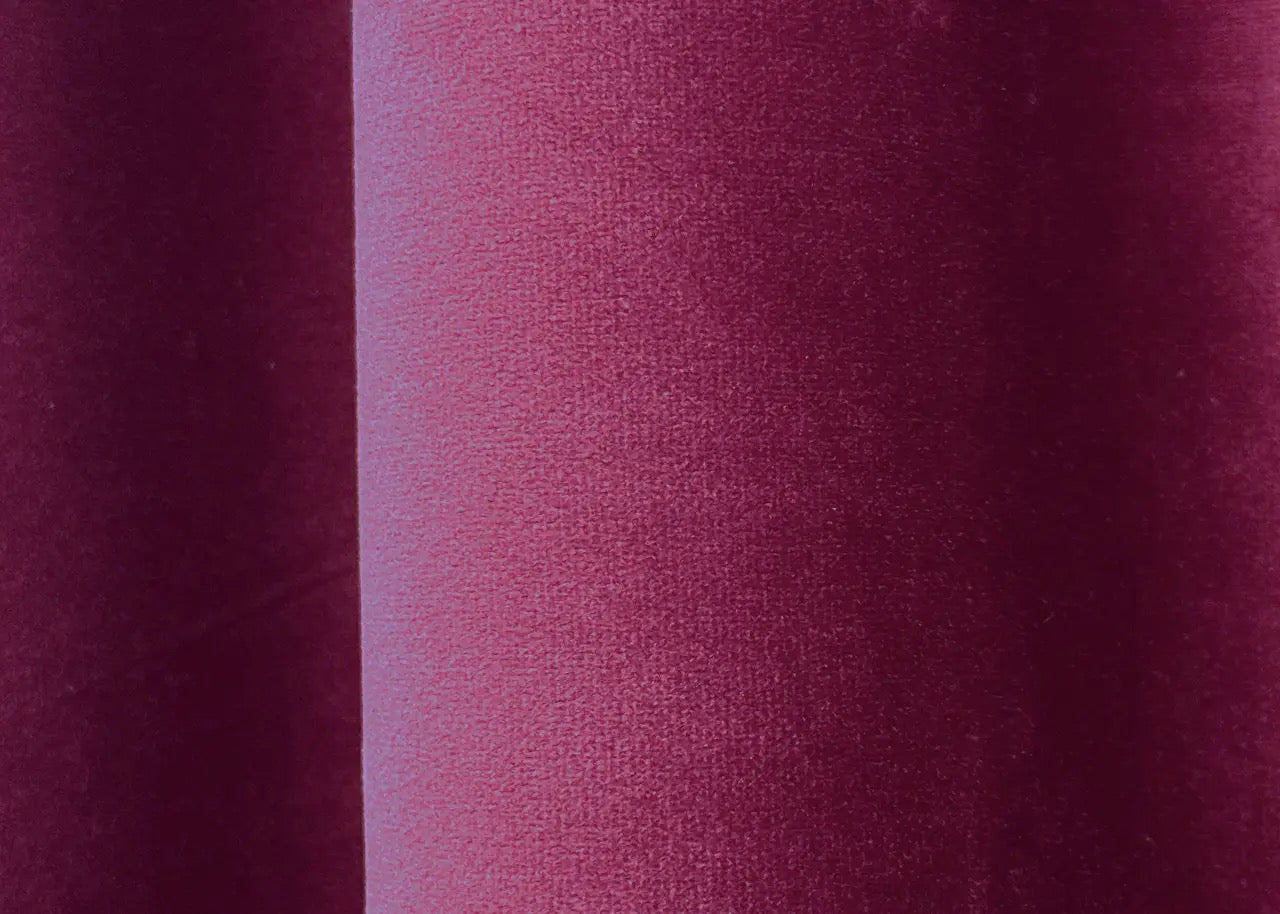 Berry-coloured premium velvet curtains, adding warmth and elegance to any home décor.