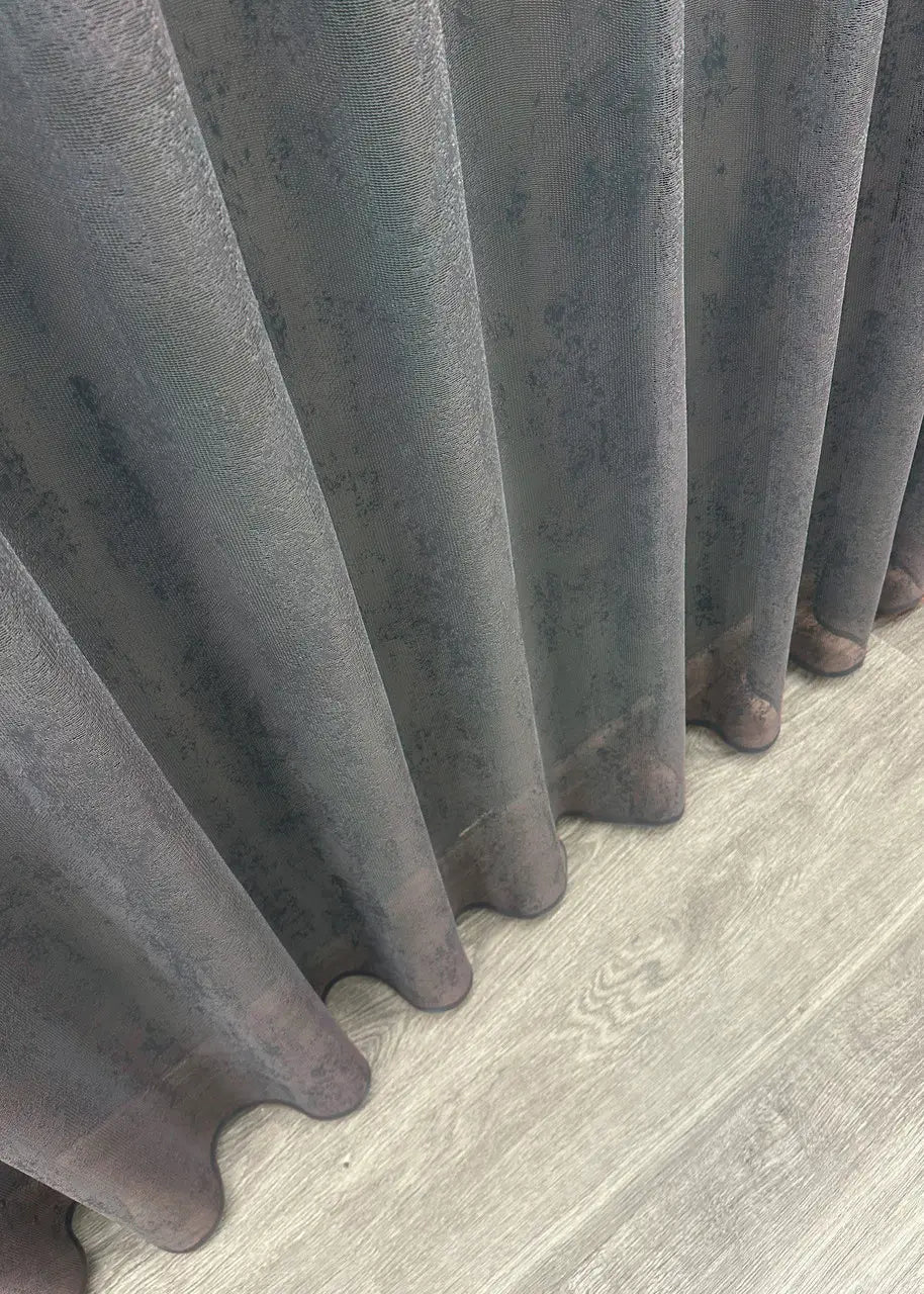 Graphite tone curtain softens daylight – summer-ready design