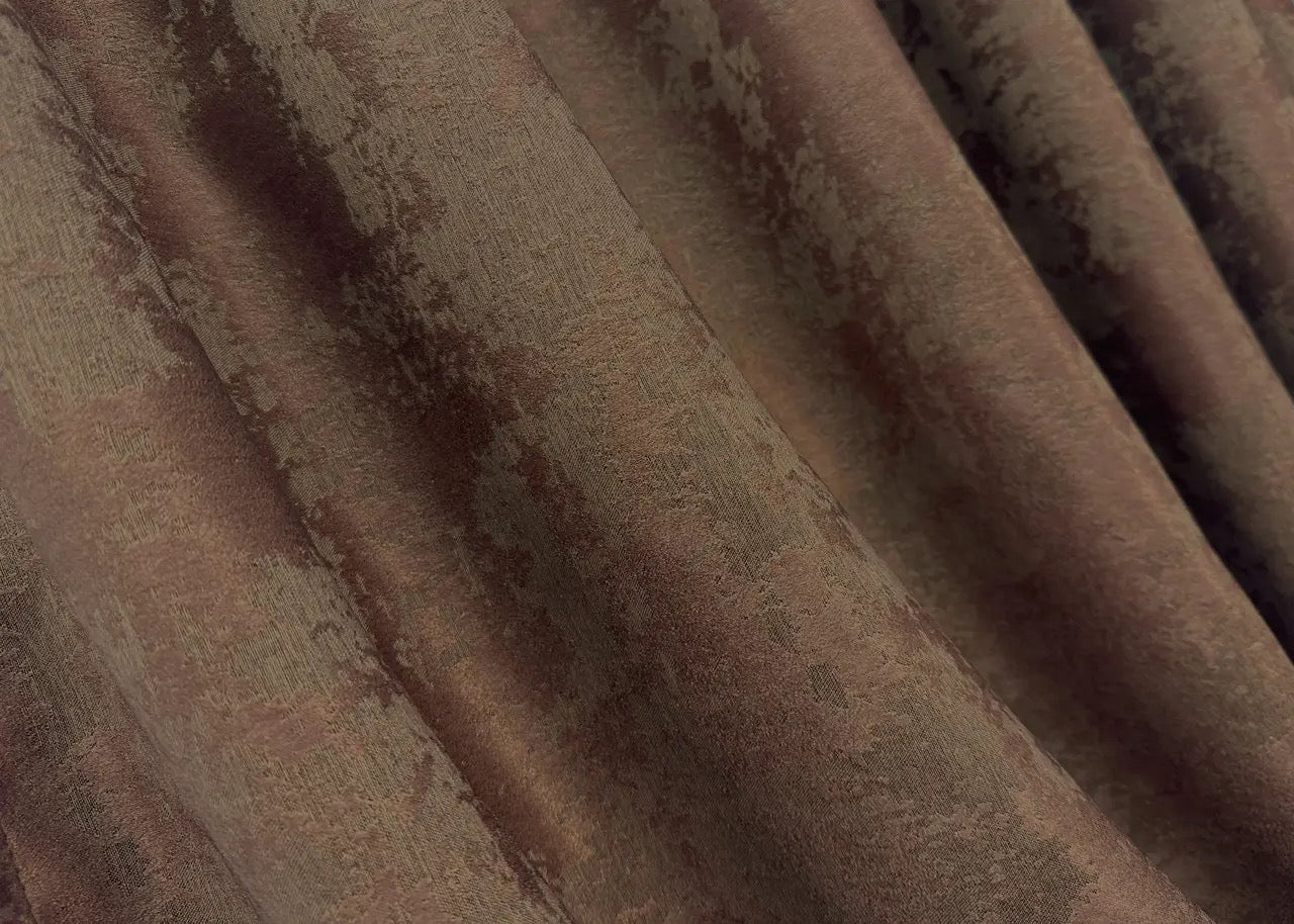Close-up of brown jacquard curtains showcasing luxurious woven texture and detailed craftsmanship from Turkey.