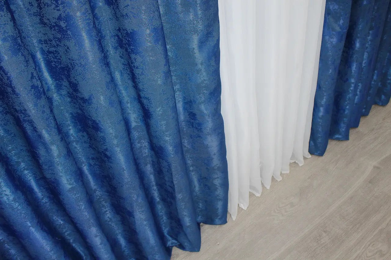 Calming Ocean Blue curtains with a rich, vibrant tone, blending seamlessly into contemporary and traditional interior designs.