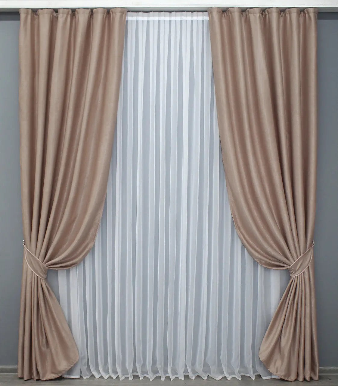 Elegant cappuccino velvet drapes with thick, high-quality fabric, designed for a sophisticated home ambiance.