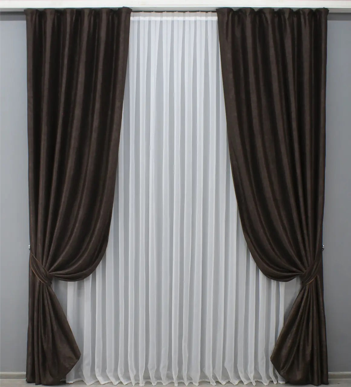 Elegant dark brown linen-soft drapes with a natural texture, perfect for creating a cozy ambiance in living rooms and bedrooms.