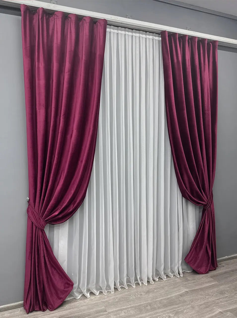Deep purple velvet drapes with premium-quality fabric, ideal for modern and classic interiors.