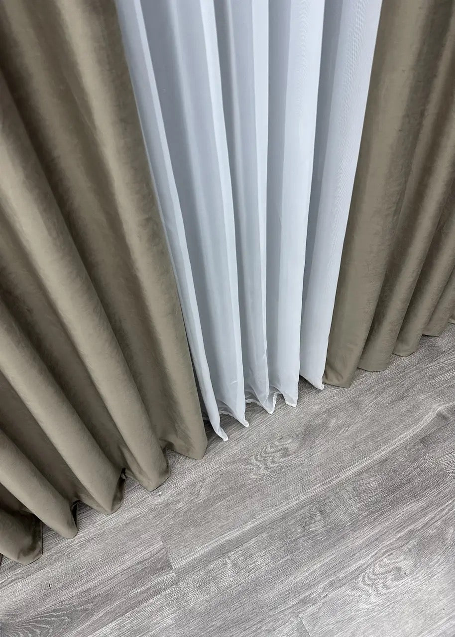 Earthy taupe velvet blackout curtains with a soft, rich texture, ideal for adding warmth and elegance to any room.