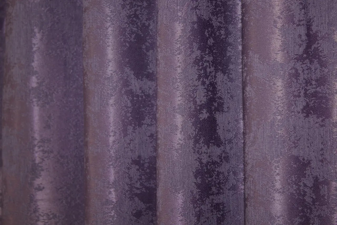 Rich purple jacquard curtains with a soft woven texture, enhancing both modern and classic home interiors.
