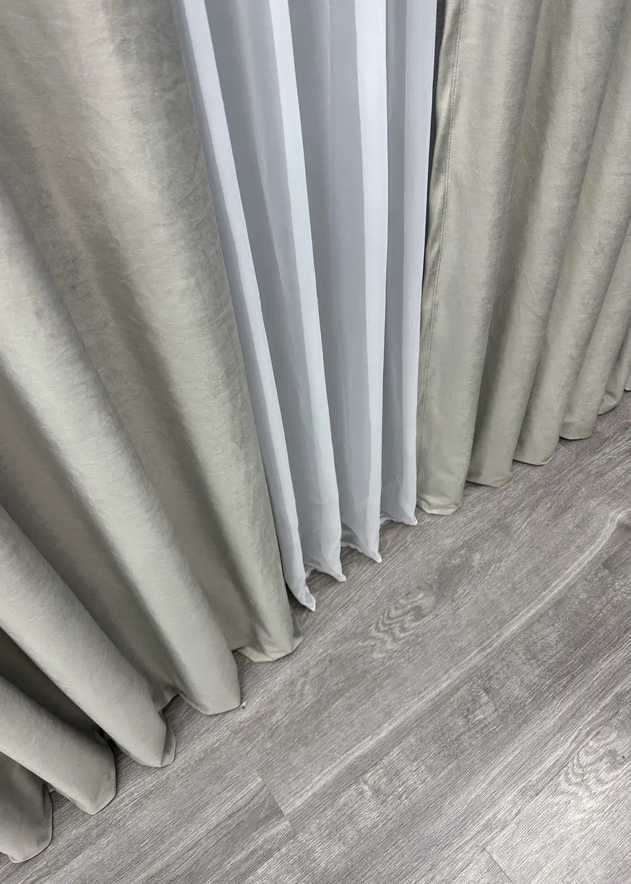 Soft-touch satin velvet curtains in a delicate shade, designed for contemporary and luxurious window treatments in any space.