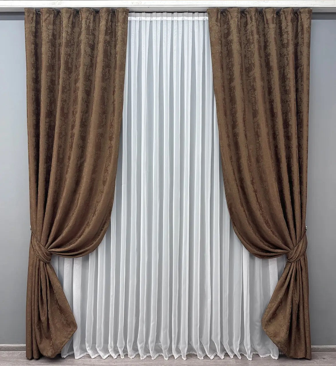 Luxury light brown jacquard curtains with intricate woven patterns, adding warmth and elegance to modern and classic interiors.