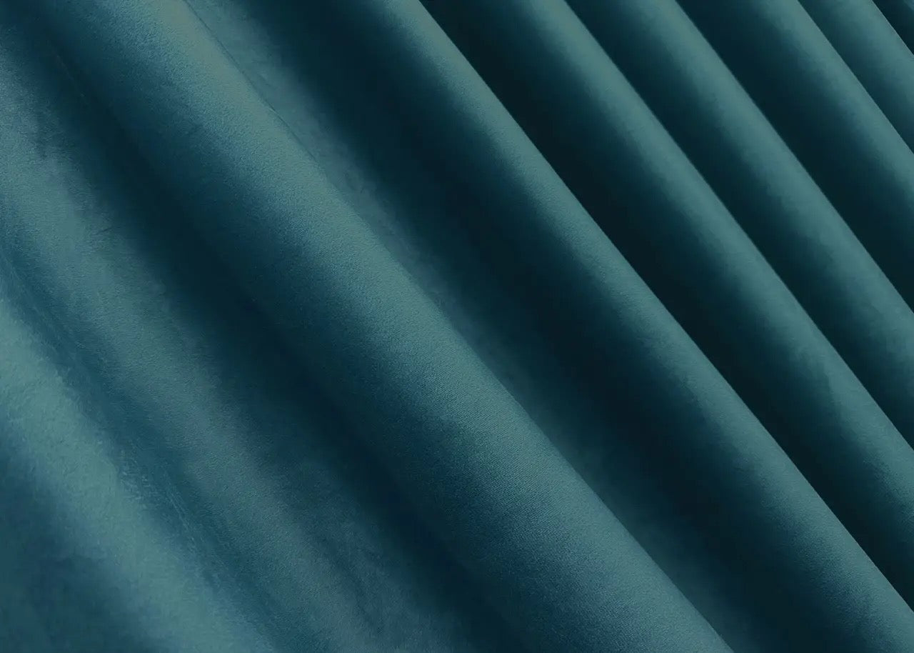Midnight teal velvet room darkening curtains, designed for modern and sophisticated interior styling.