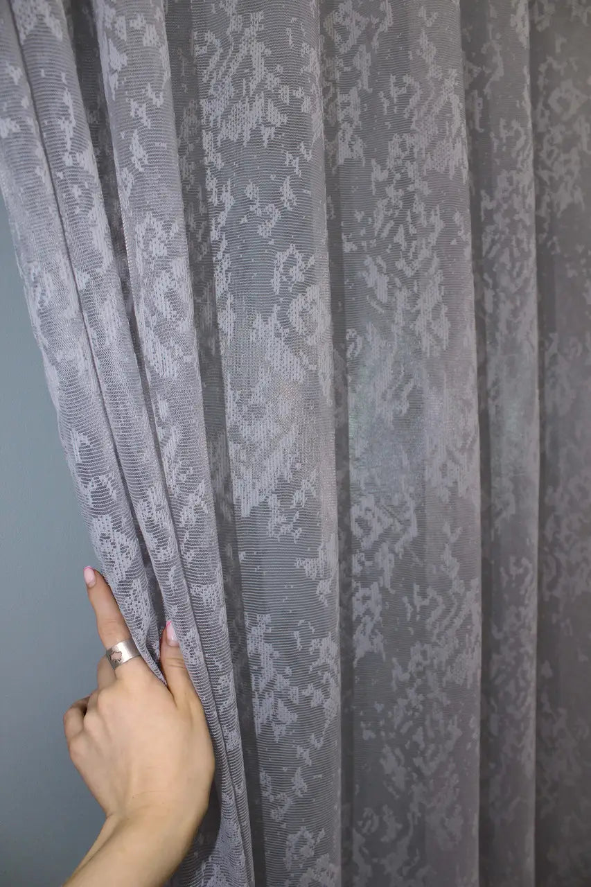 Neutral grey curtain for calm, balanced home decor