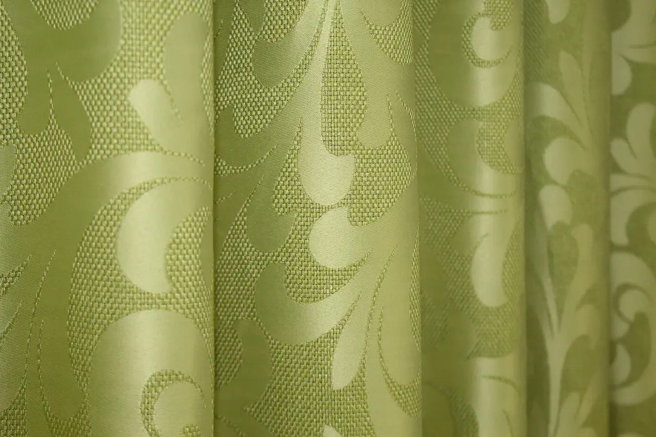 Classic olive green Venzel curtains with a timeless decorative design, ideal for sophisticated home styling.