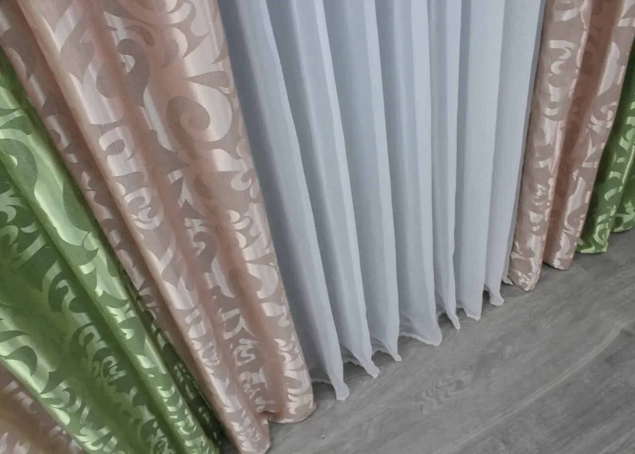 Delicate and vibrant powder pink and lime green jacquard curtains, perfect for creating a bright yet refined atmosphere in any contemporary or classic space.