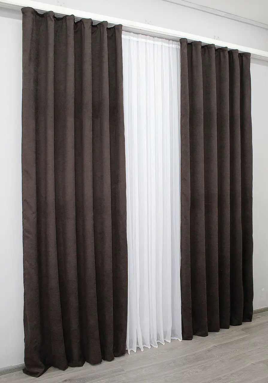 Classic dark brown microvelvet curtains with a refined drape, perfect for contemporary and industrial-style interiors.