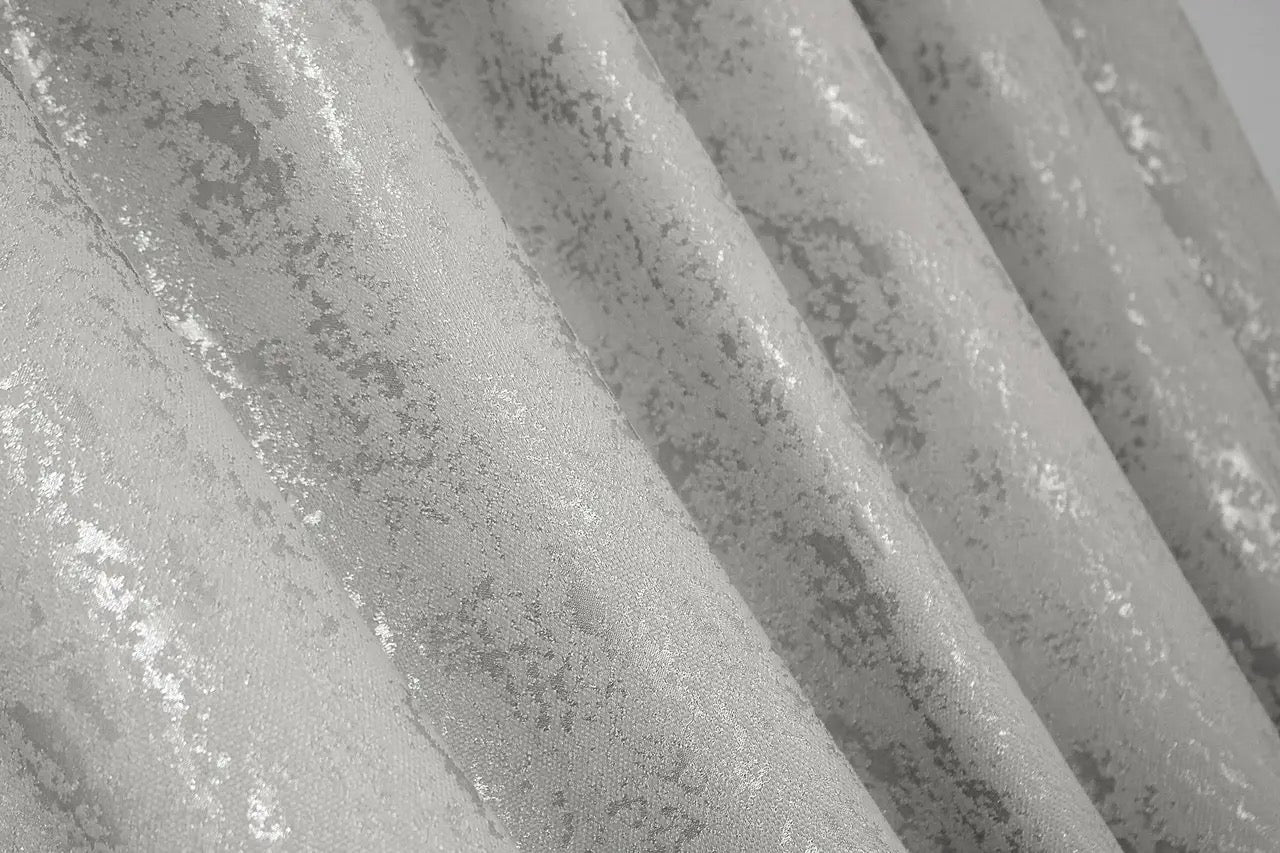 High-quality silver linen curtains with a textured marble pattern, enhancing any space with modern elegance.