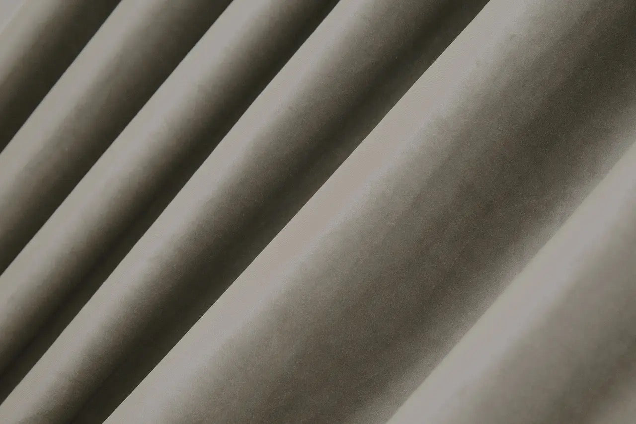Luxurious moss velvet blackout drapes for bedrooms and living rooms, providing warmth and sophistication with excellent light control.
