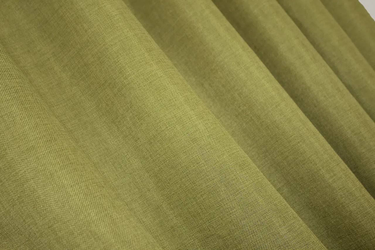 Soft burlap linen curtains in a neutral olive shade, ideal for modern, Scandinavian, and loft-style homes.