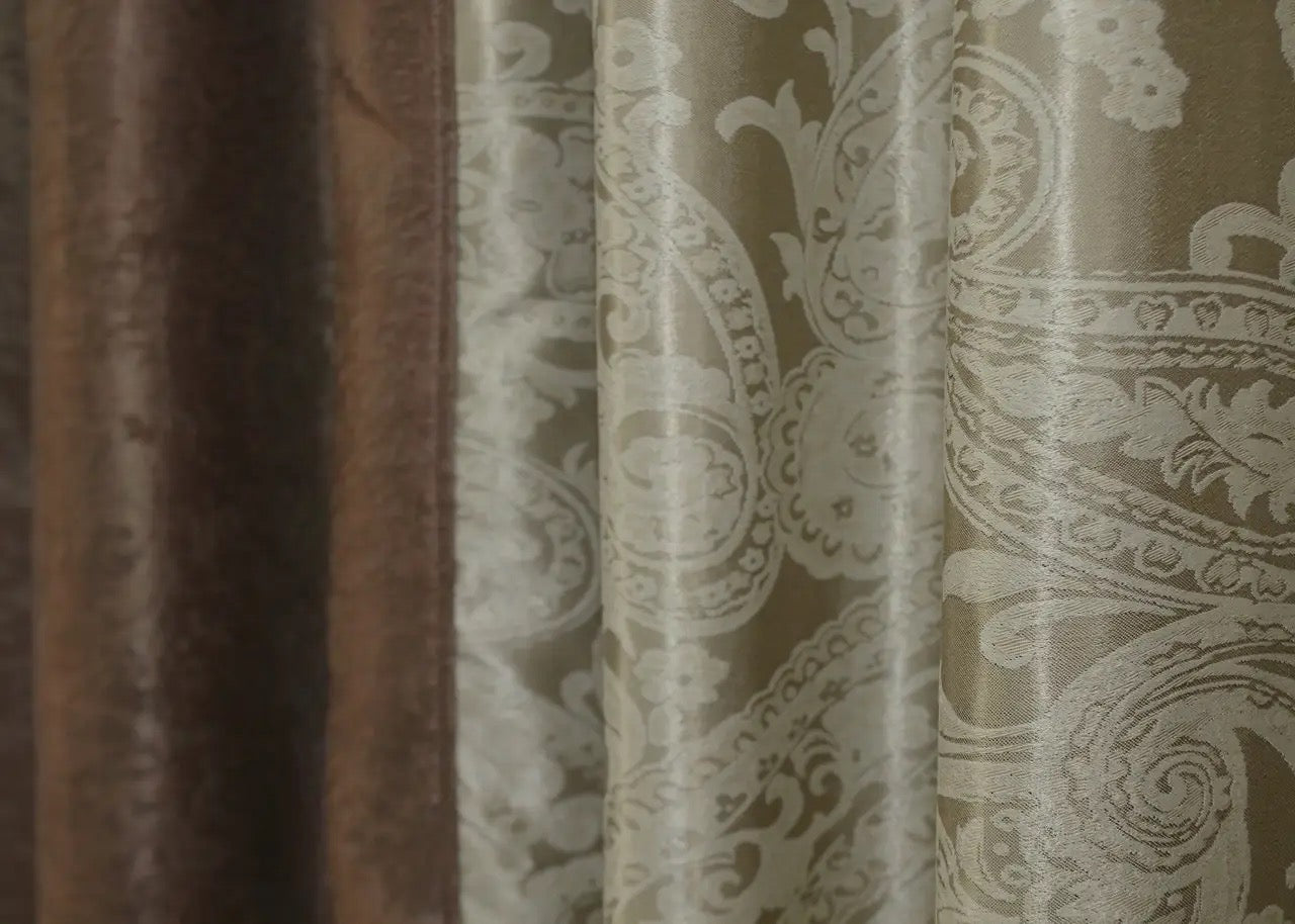 Brown and beige two-tone curtains with soft fabric drapery, offering a polished finish for any room in your home.