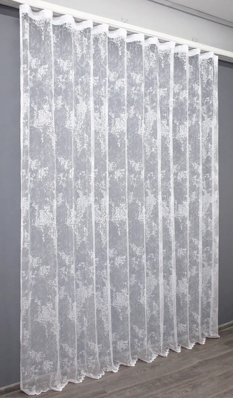 Soft white curtain filtering daylight – light jacquard texture