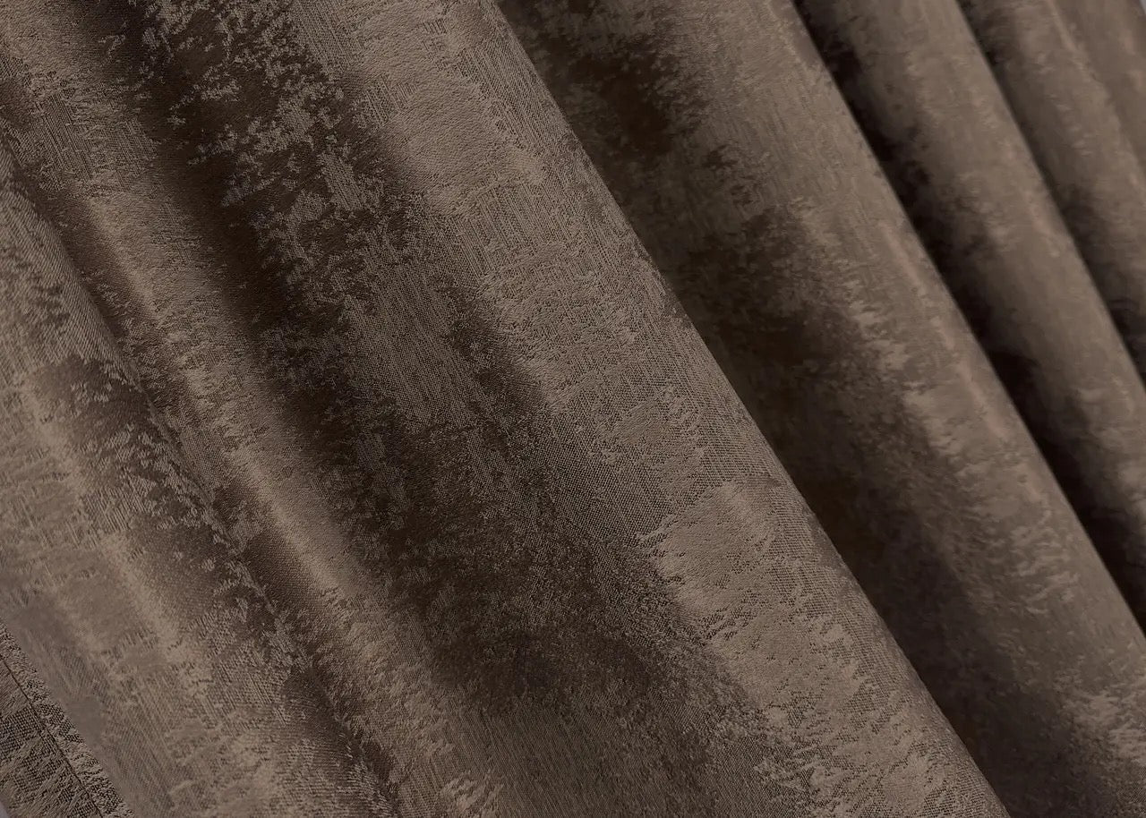 Opulent brown curtains with a textured jacquard design, bringing warmth and elegance to your home décor.