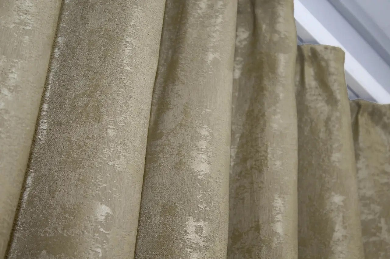 Classic gold curtains with a delicate jacquard weave, adding a radiant and inviting feel to any space.