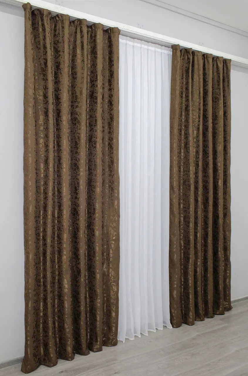 Luxury brown linen curtains with a smooth and refined finish, ideal for creating a cosy and intimate ambience.