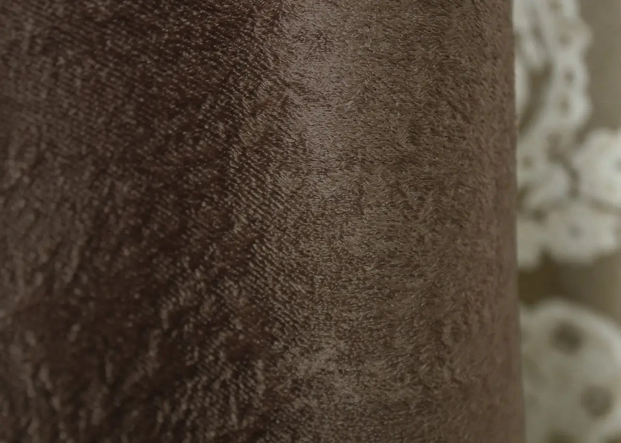 Timeless and versatile brown and beige curtains with soft fabric, suitable for both modern and traditional home décor styles.