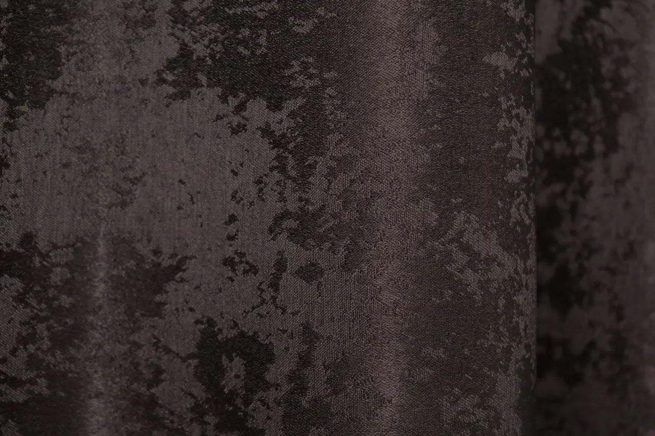 Elegant wenge curtains styled in a bedroom setting, creating a warm, cozy, and refined atmosphere.