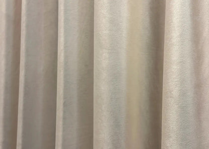 Almond beige premium velvet curtains, adding warmth and elegance to any home décor.
