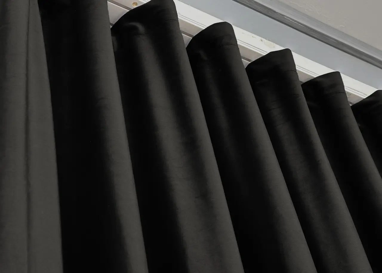 Anthracite velvet room darkening curtains, designed for modern and sophisticated interior styling.
