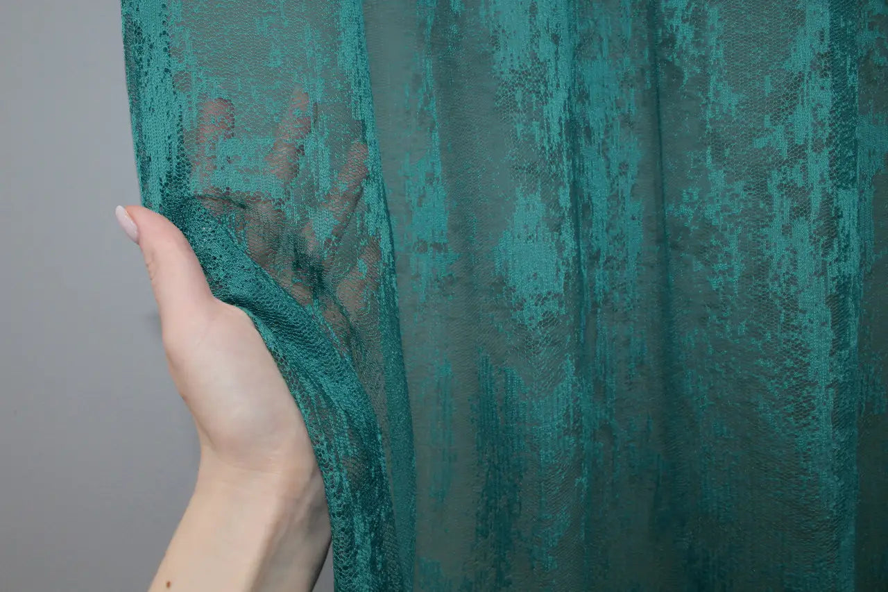 Aqua-coloured sheer curtain – adds freshness and light