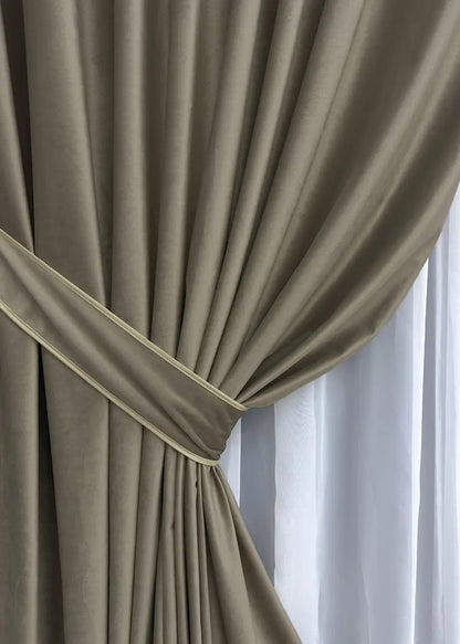 Ash brown velvet curtain panels, featuring noise-absorbing material and a luxurious soft feel.
