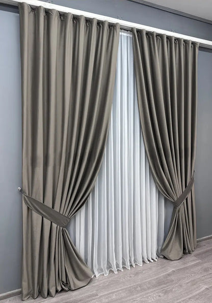 Smoke grey premium velvet curtains with a soft, high-density fabric, ideal for noise insulation and stylish home furnishing.
