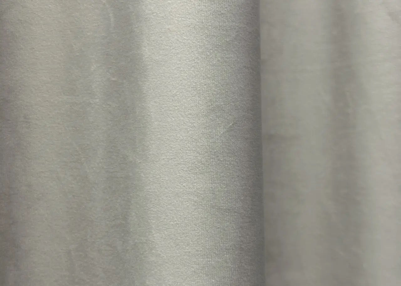 Light sand satin velvet curtains with premium blackout properties, blending perfectly with neutral and elegant interior designs.
