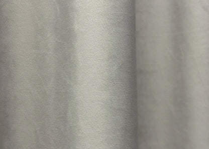 Light sand satin velvet curtains with premium blackout properties, blending perfectly with neutral and elegant interior designs.
