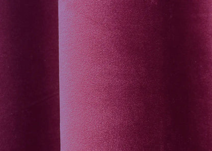 Berry-coloured premium velvet curtains, adding warmth and elegance to any home décor.
