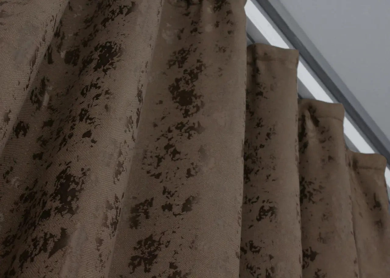 Soft and stylish brown linen drapes, complementing rustic, neutral, and earthy interior designs.
