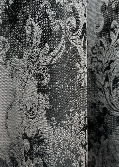 Black and grey premium linen curtains styled in a modern interior with elegant decor.