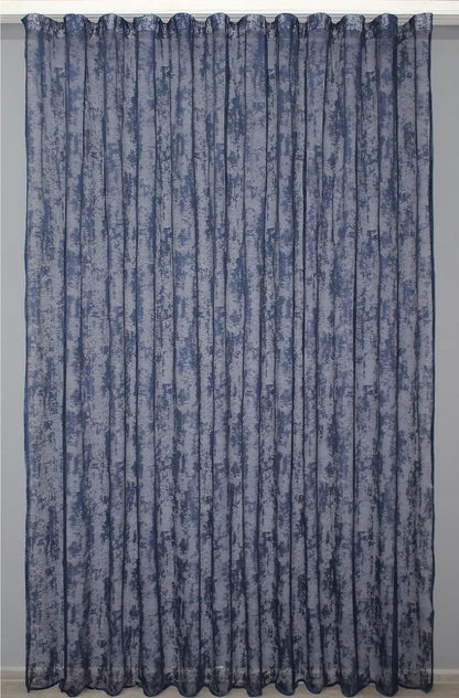 Sheer navy curtain designed to allow gentle light and airflow