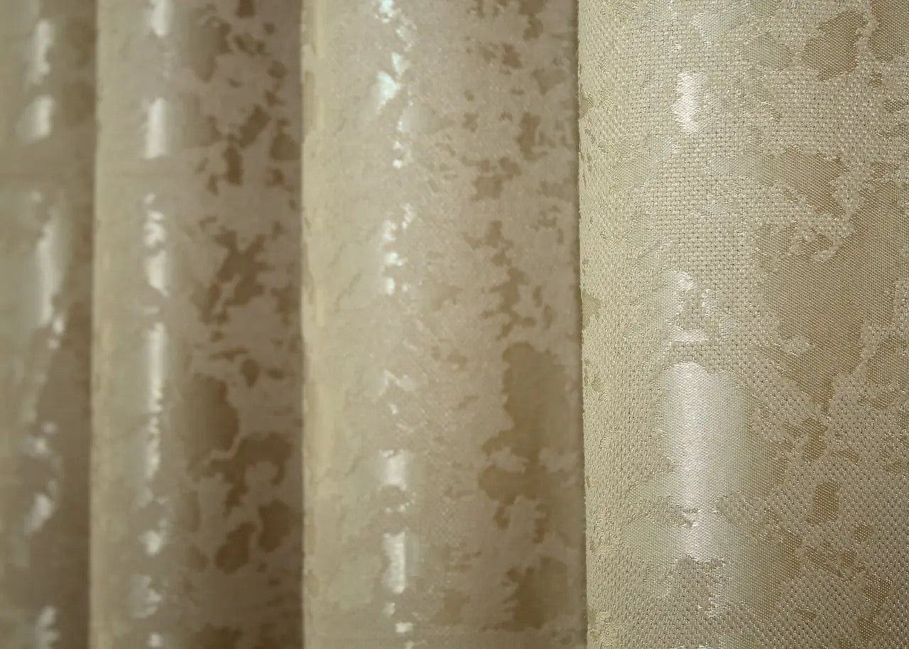 Contemporary beige marble-patterned linen curtains, designed for modern and minimalist home styling.
