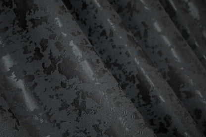 Contemporary blue-graphite marble-patterned linen curtains, designed for modern and industrial home styling.
