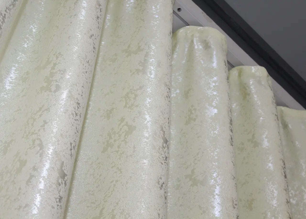 Breathable cream linen drapes with a light-filtering effect for a cosy and inviting atmosphere.
