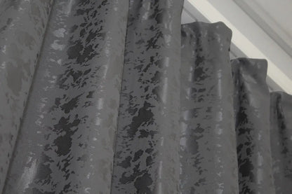 Contemporary grey marble-patterned linen curtains, designed for modern and refined home styling.
