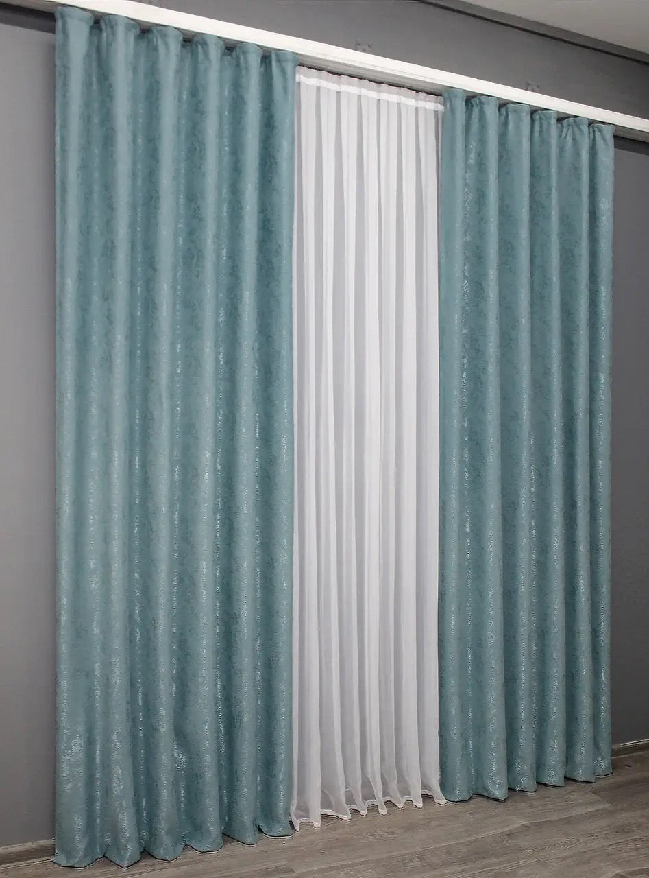 Modern sky blue linen curtains, designed to softly filter light while maintaining a tranquil atmosphere.

