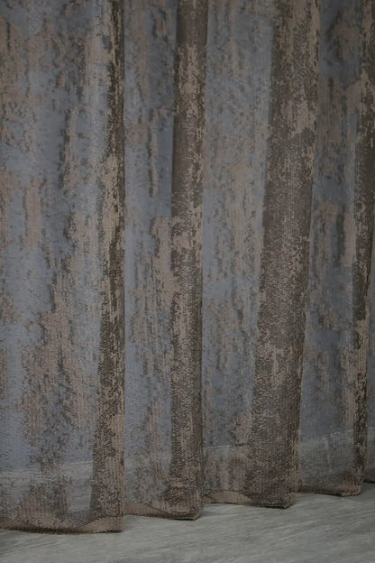 Jacquard curtain in brown with lightweight, open-weave texture