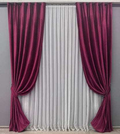 Burgundy velvet blackout curtains, adding a touch of elegance and style to any living space.
