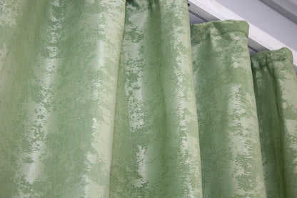 Calming mint curtains with a light green tone, blending seamlessly into contemporary and traditional interior designs.
