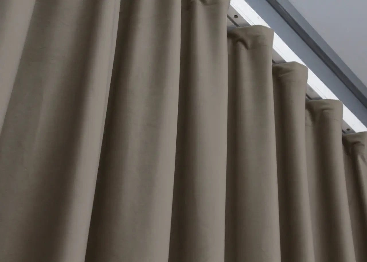 Cappuccino brown velvet curtains with a rich and smooth texture, ideal for elegant window treatments in living rooms and bedrooms.
