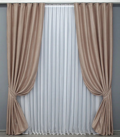 Elegant cappuccino velvet drapes with thick, high-quality fabric, designed for a sophisticated home ambiance.
