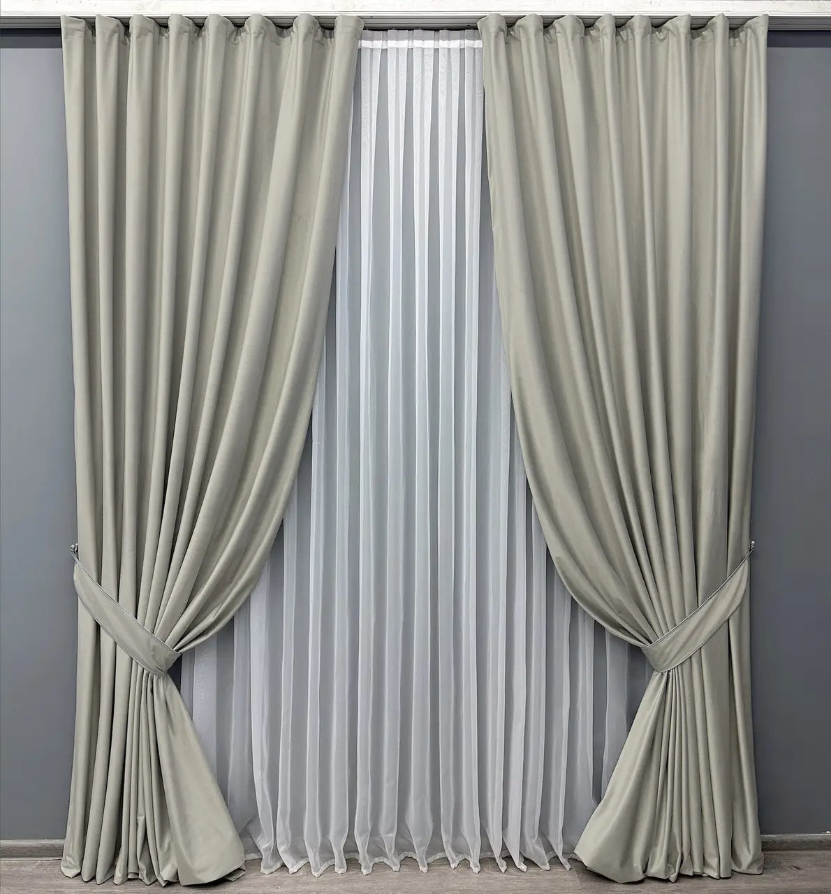 Premium pearl satin velvet drapes with a silky-smooth finish, offering high-quality blackout and room darkening effects for home interiors.
