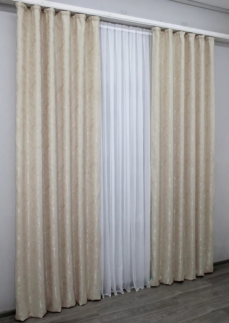 Stylish and contemporary light beige linen drapes with a soft marble pattern for a bright and airy space.
