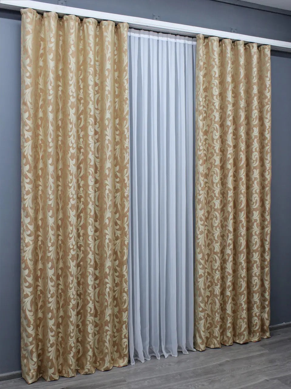 Soft and breathable beige linen curtains with intricate Venzel detailing for a cosy atmosphere.
